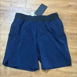 NEW WITH TAGS Men’s Fabletics Blue The 7” Franchise Athletic Shorts SMALL